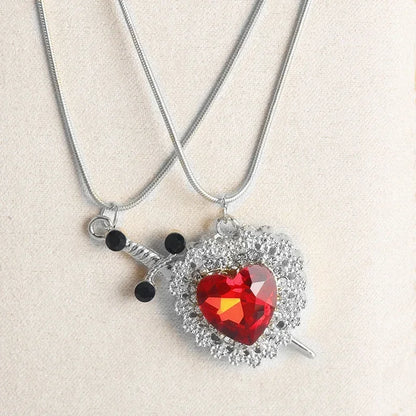 Interlocking Heart & Sword Necklace Set